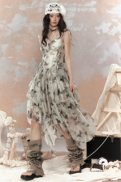 Abito asimmetrico in chiffon con farfalla