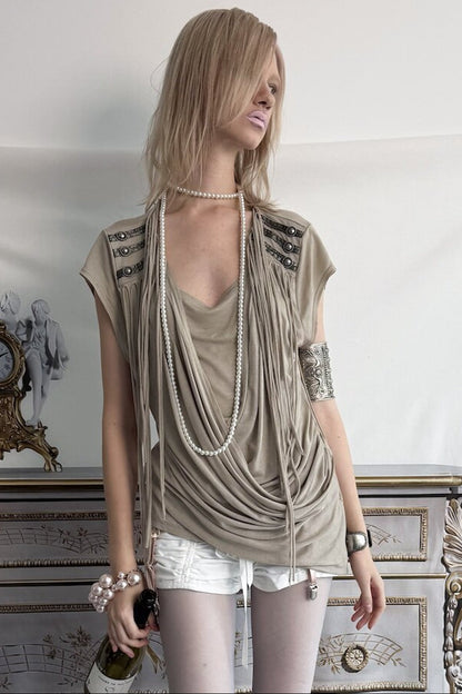 Top in maglia drappeggiato con nappine