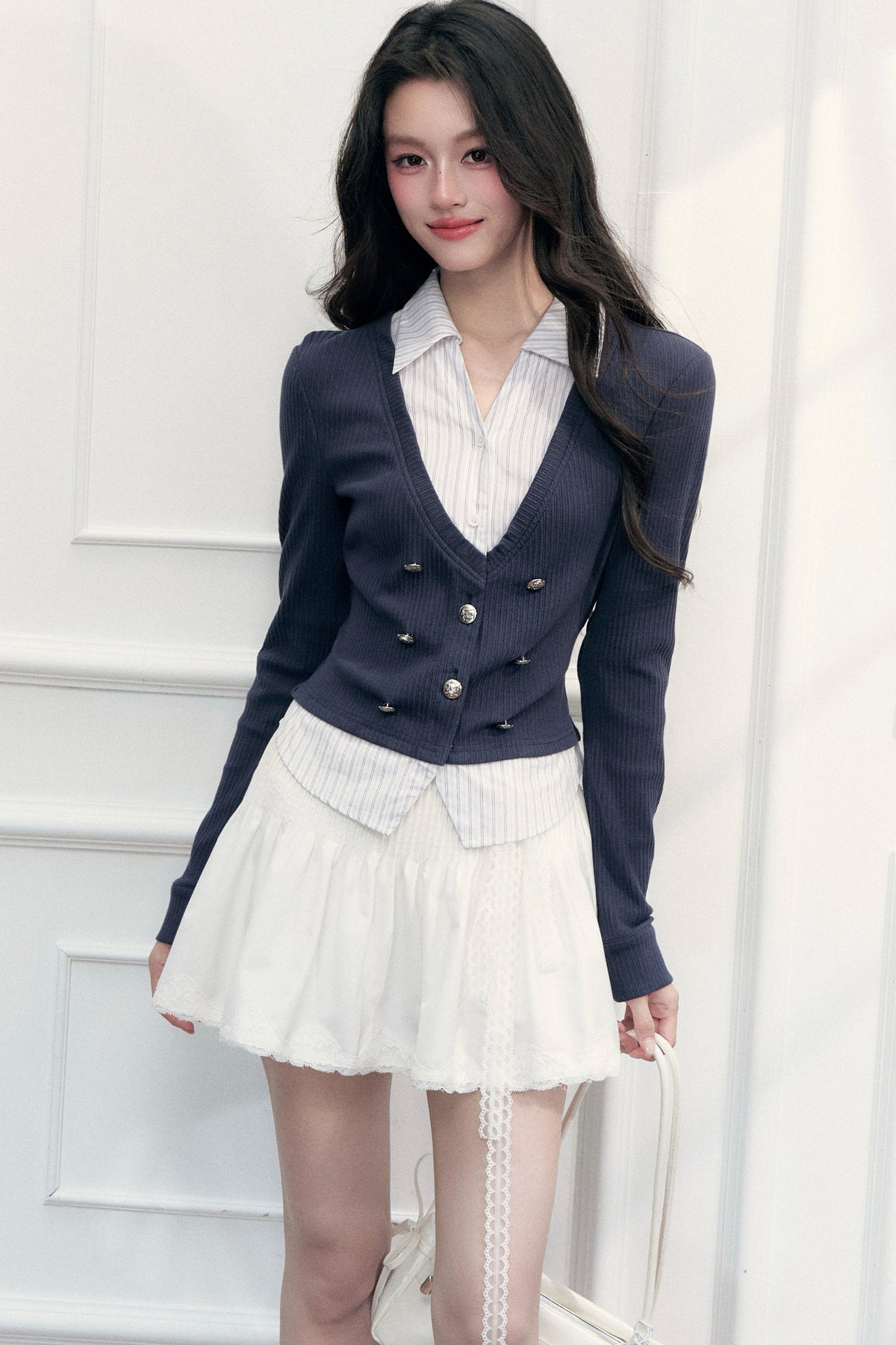 Top in maglia con scollo a V effetto stratificato