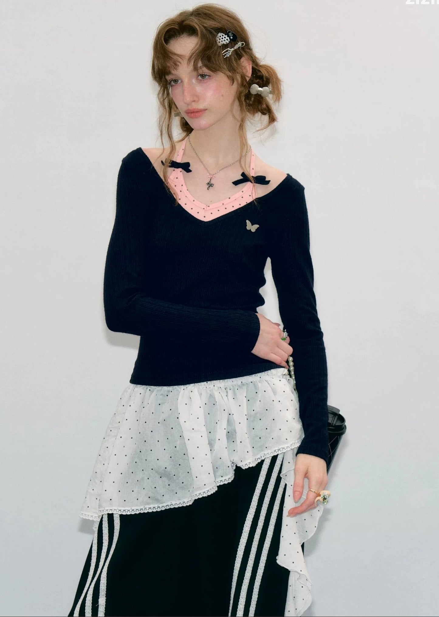 Top a maglia a maniche lunghe con farfalle e pois