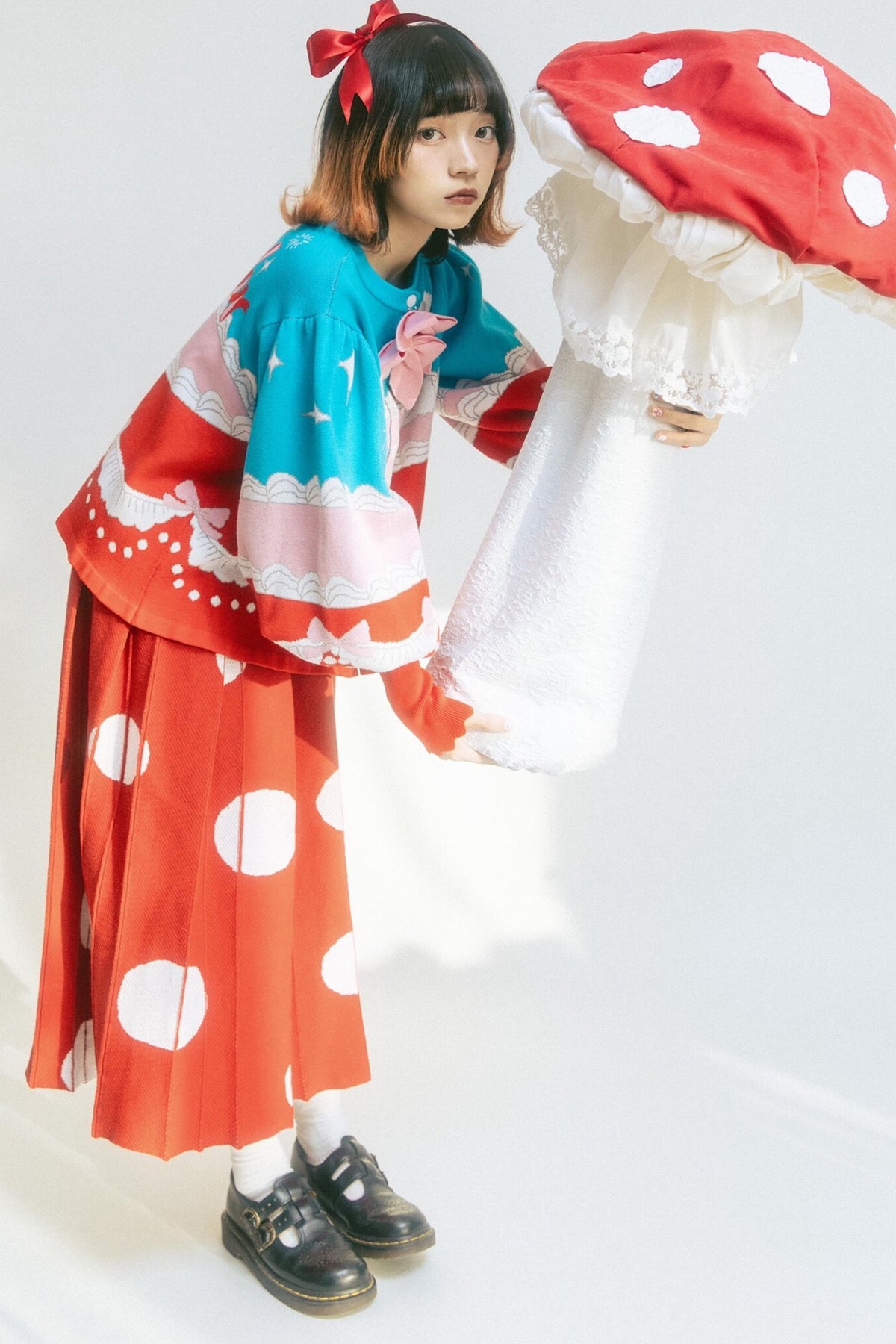 Cardigan a maglia con fiocco e coniglio