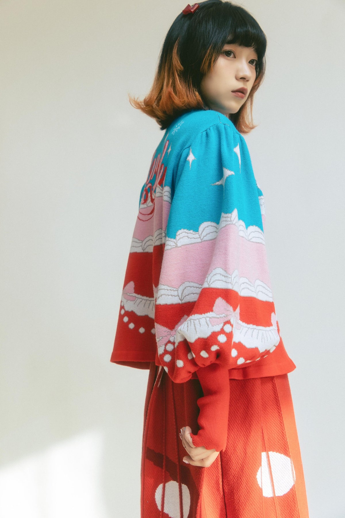 Cardigan a maglia con fiocco e coniglio
