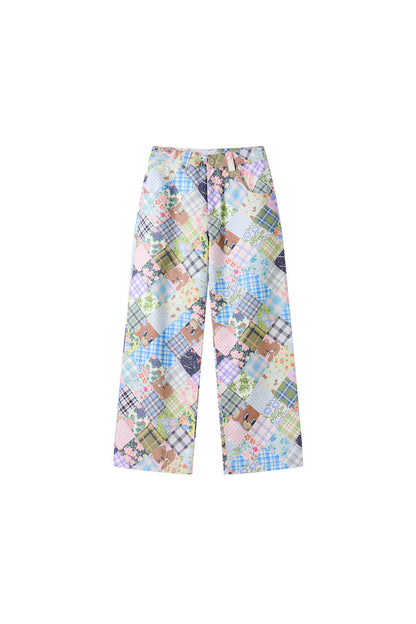 Pantaloni a vita bassa a toppe con orso e fiori