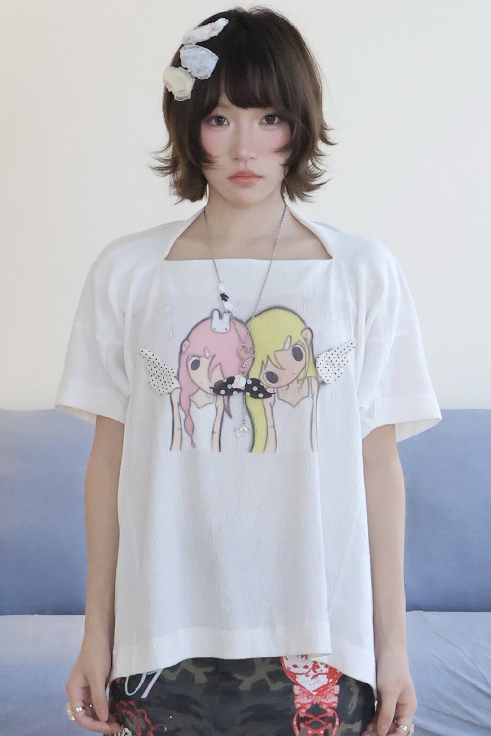 Haut ample en coton à épaules tombantes avec illustration