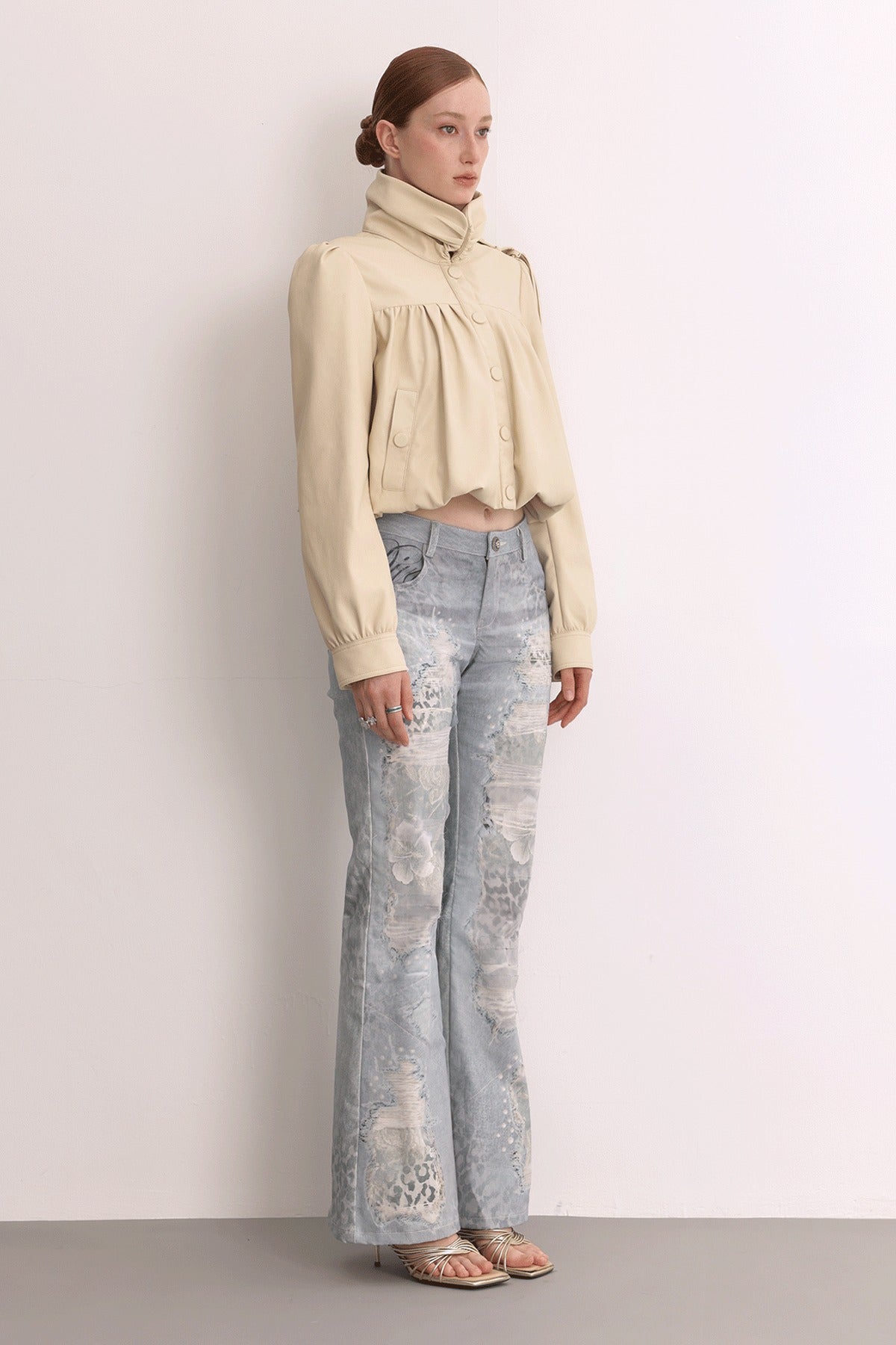 Jeans in mesh leopardato slavato a doppio strato