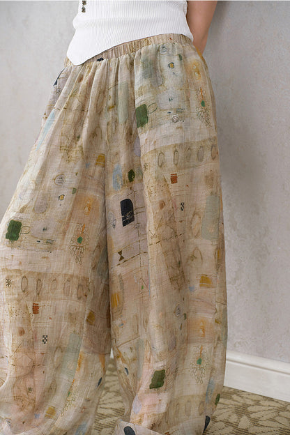 Pantaloni kaki a gamba larga con stampa astratta testurizzata