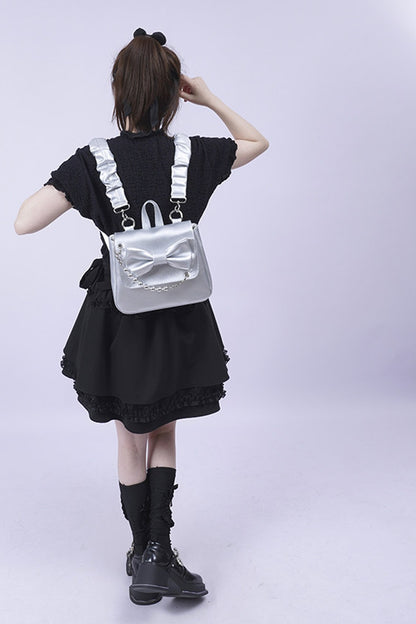 Silver Bow Crossbody Backpack
