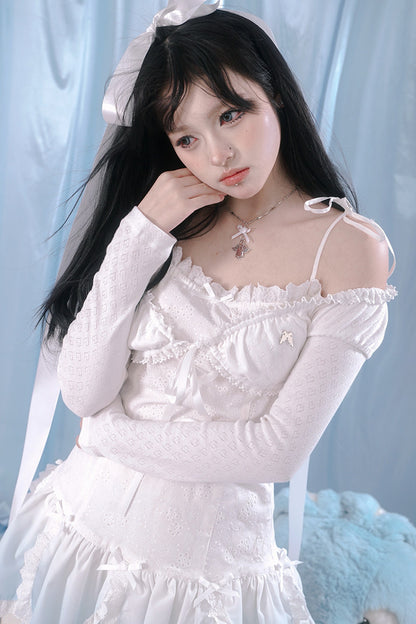 Top in maglia con pizzo a forma di cuore