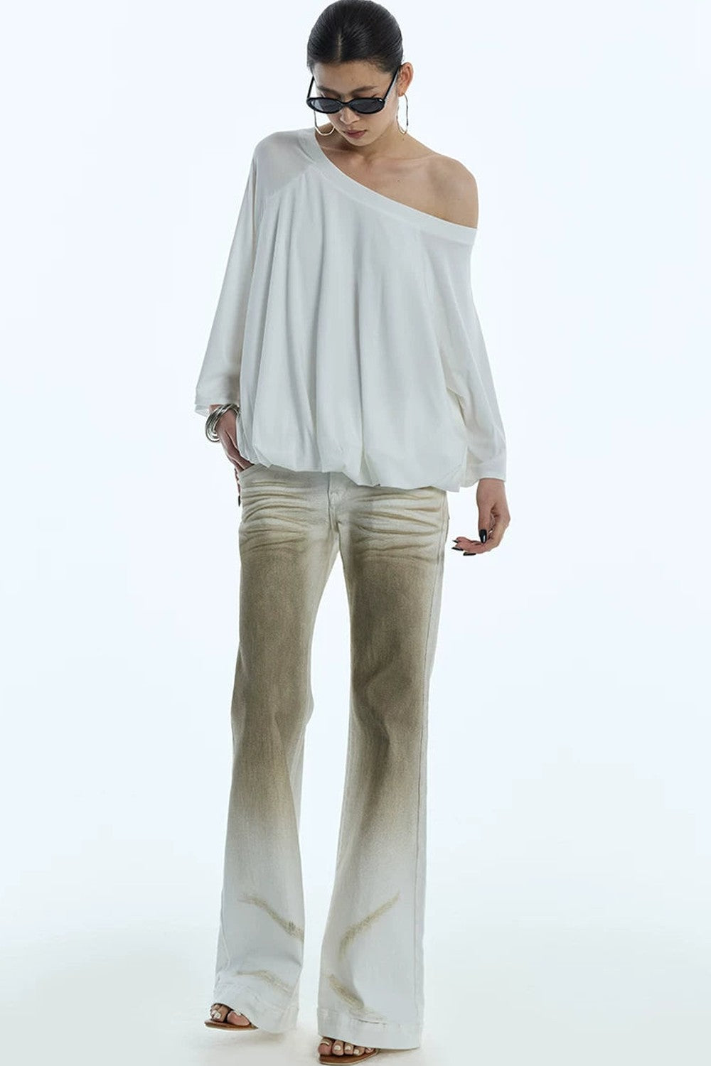 Blusa floreale con maniche a sbuffo e spalle scoperte