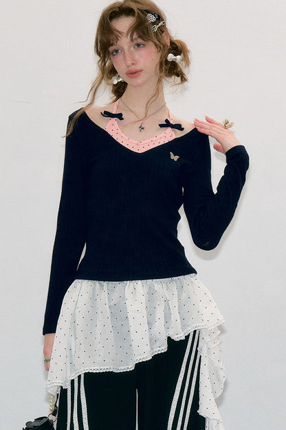 Top a maglia a maniche lunghe con farfalle e pois