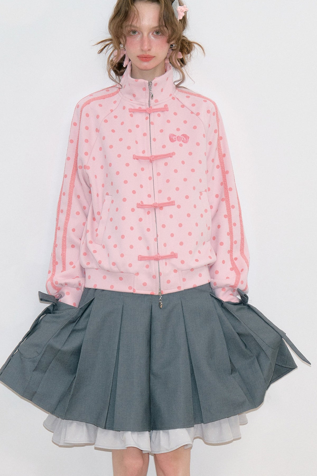 Giacca rosa a pois con zip