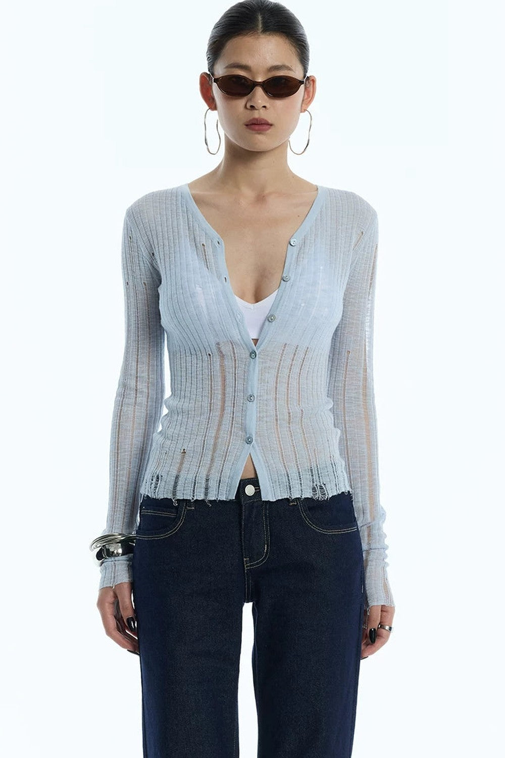 Cardigan en maille noir rayé à découpes