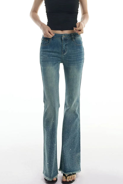 Schlag-Jeanshose mit Strass