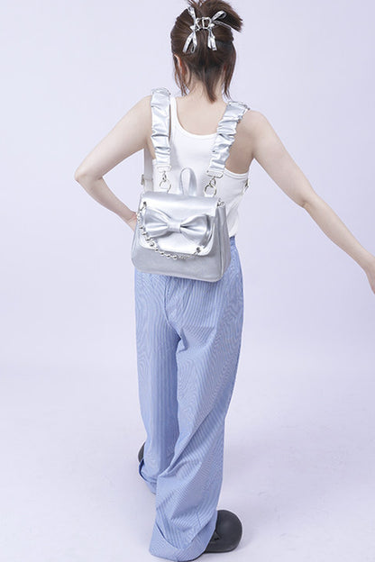 Silver Bow Crossbody Backpack