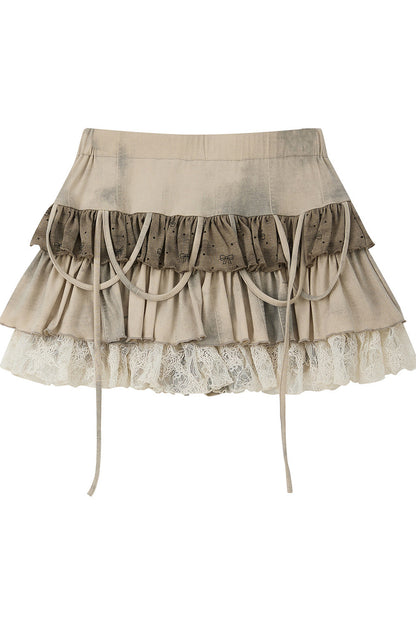 Gonna a balze in pizzo tie-dye con fiocco