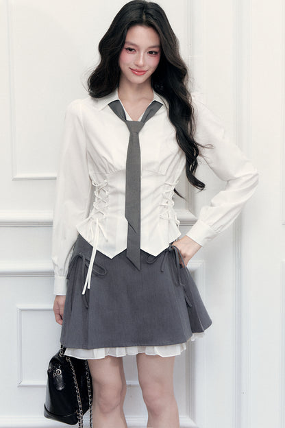 Ensemble blouse à nœud coulissant et jupe