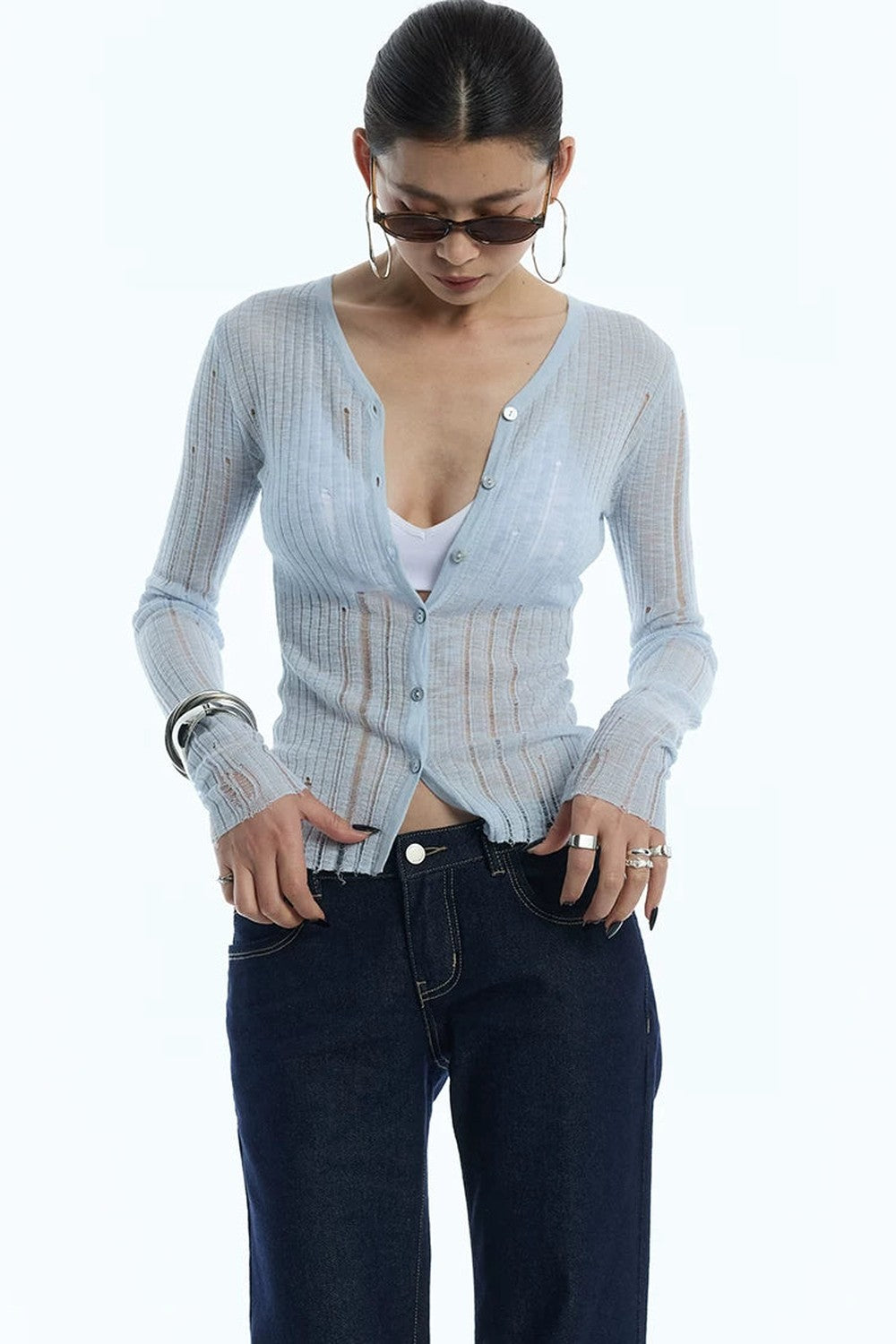 Cardigan en maille noir rayé à découpes