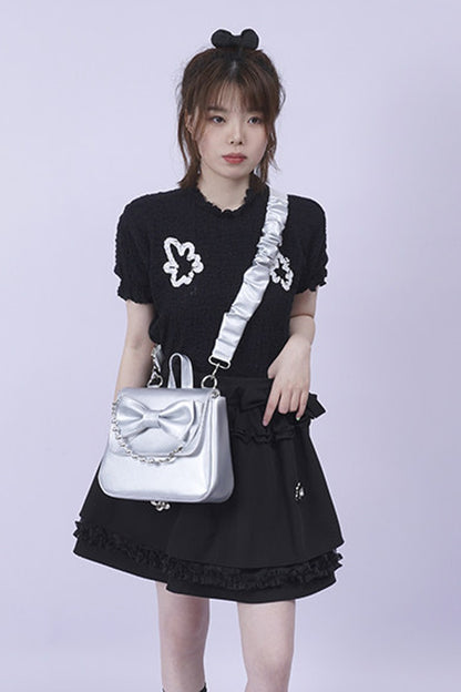Silver Bow Crossbody Backpack