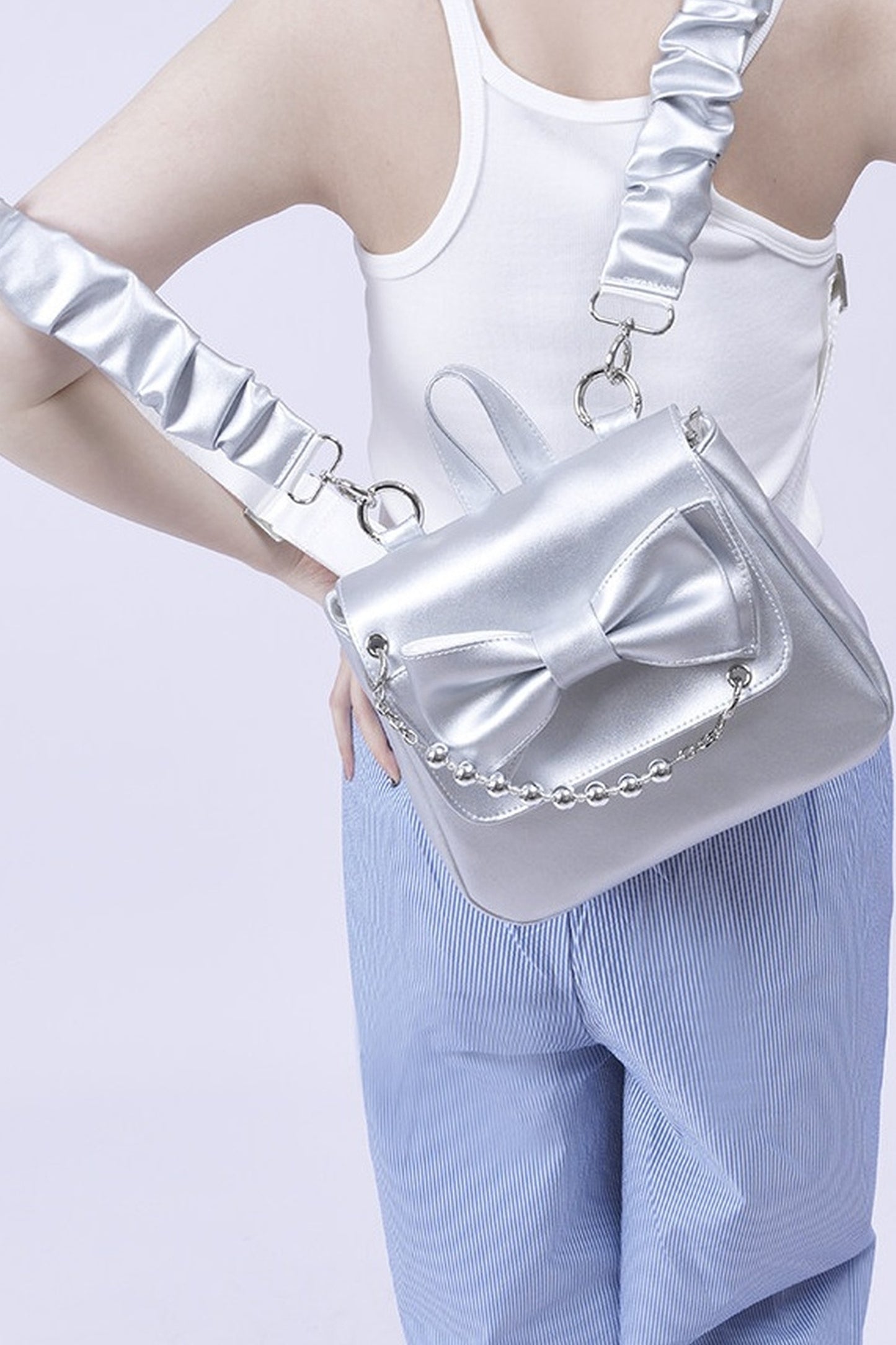 Silver Bow Crossbody Backpack