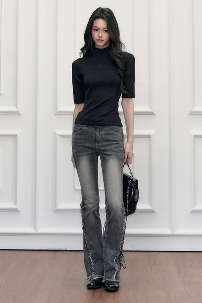 High-Waist-Jeans im Used-Look mit Schlag