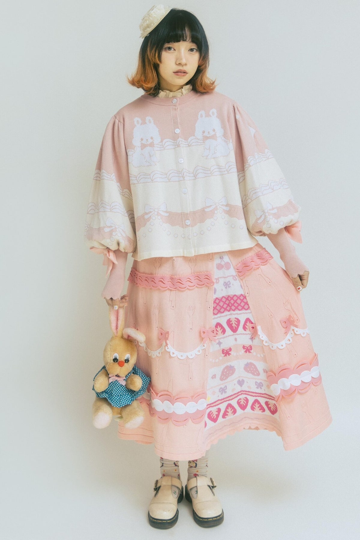 Cardigan a maglia con fiocco e coniglio
