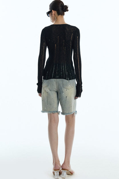 Cardigan en maille noir rayé à découpes