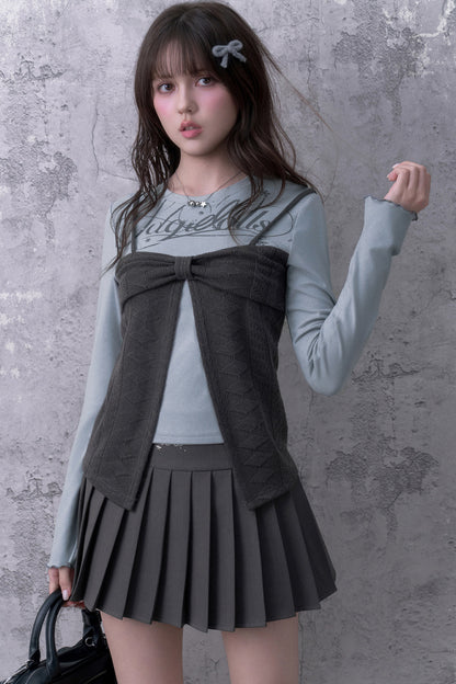 Blusa a maniche lunghe blu-grigia con fiocco e effetto a strati