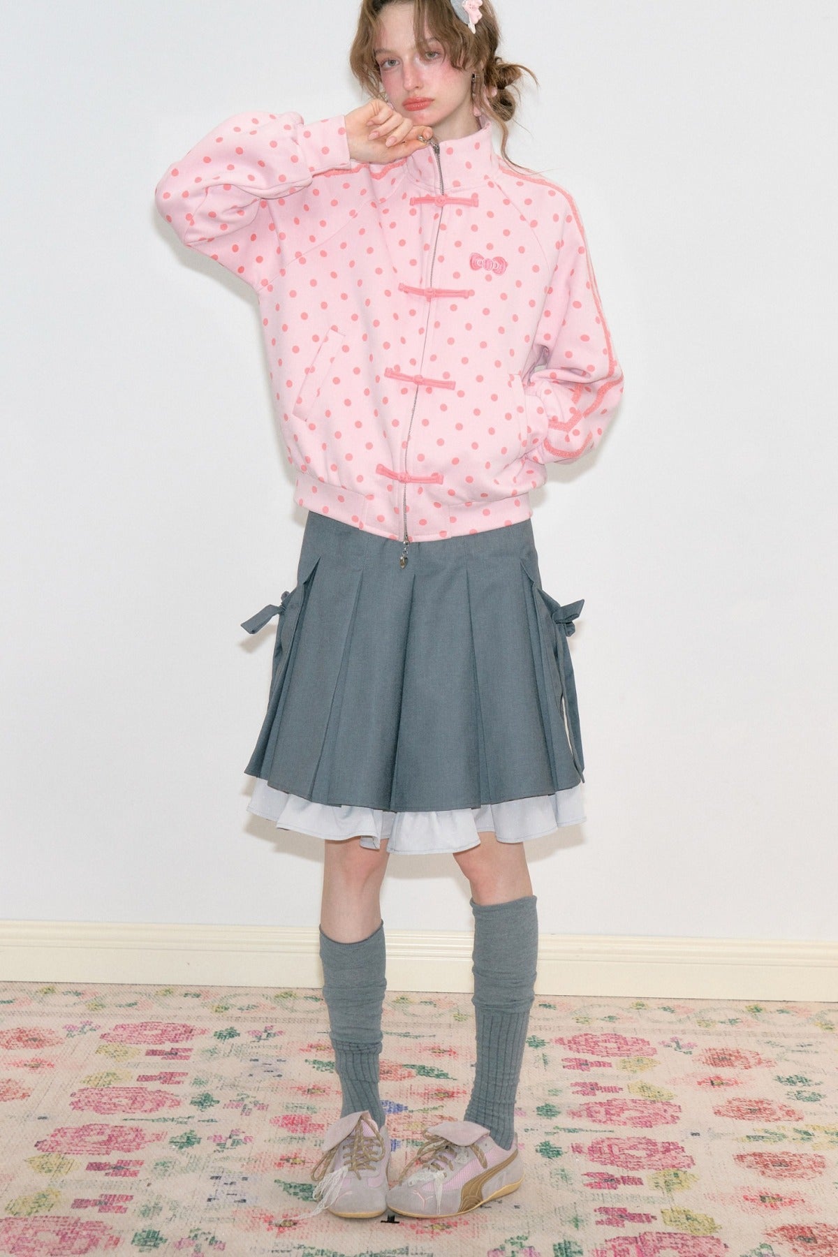 Giacca rosa a pois con zip