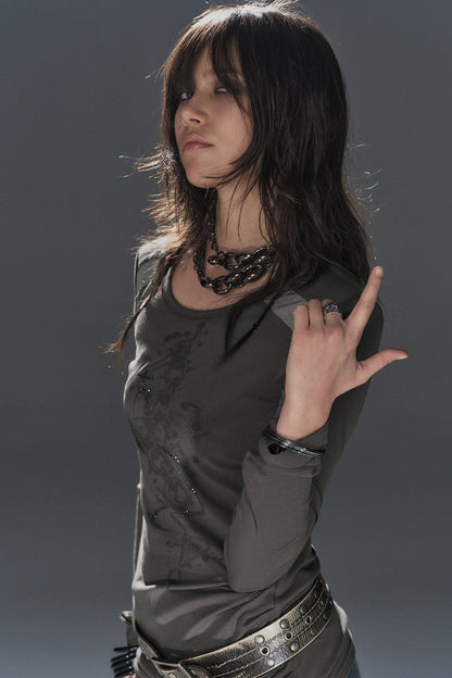 Top in mesh bicolore con strass