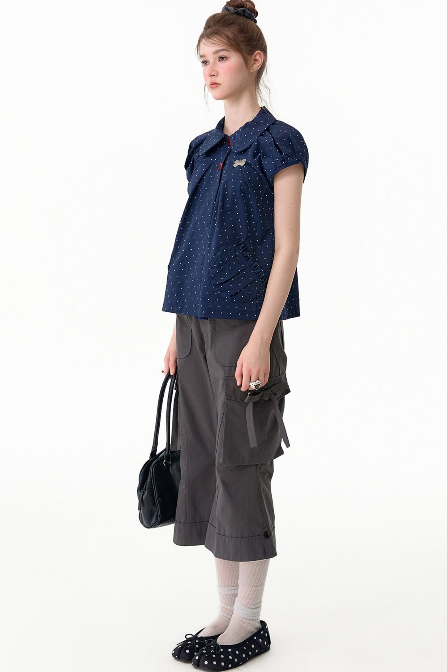 Camicia blu scuro a pois con colletto Peter Pan