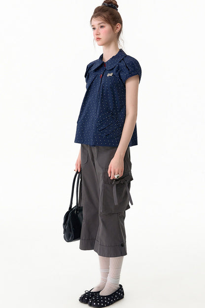 Camicia blu scuro a pois con colletto Peter Pan