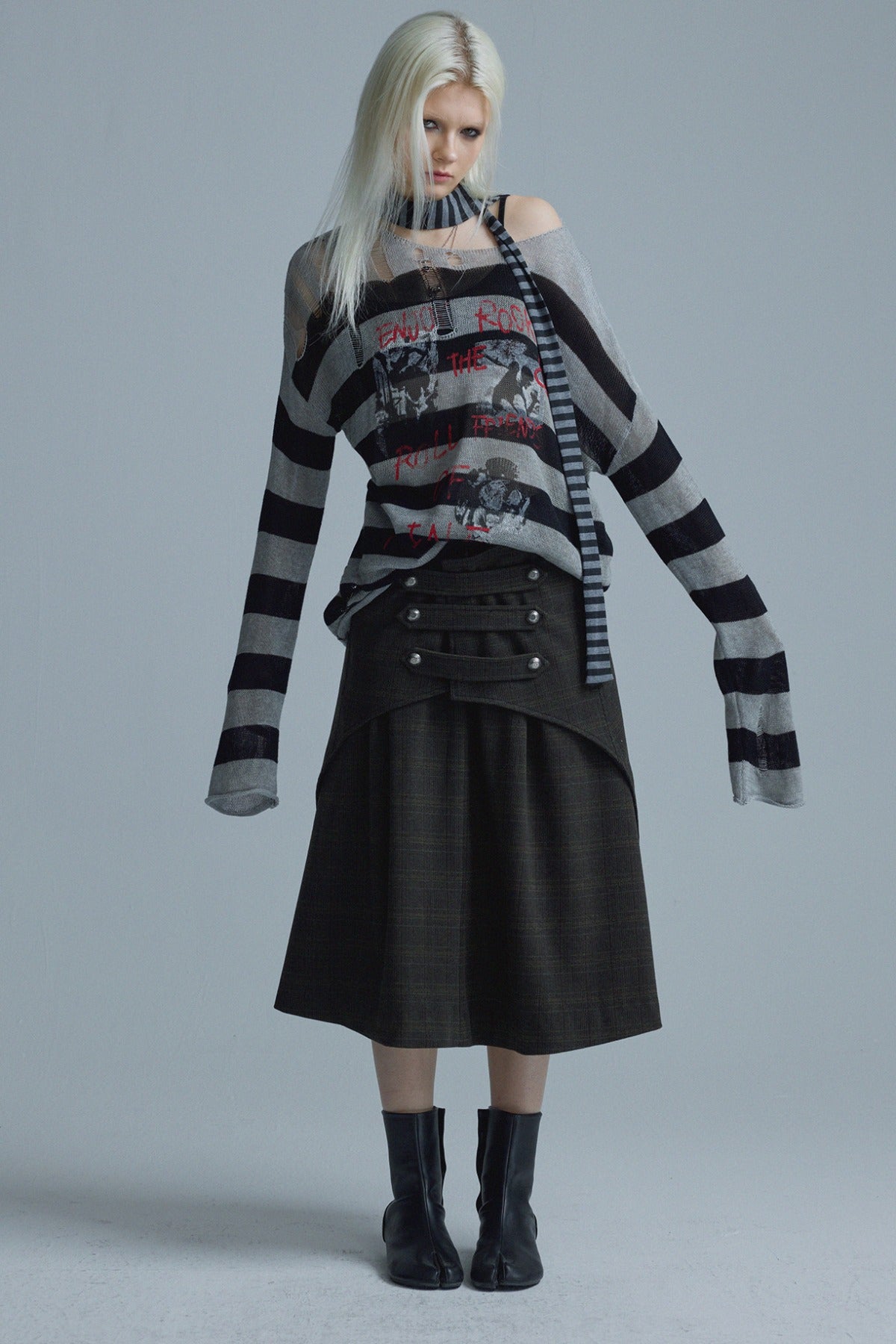 Top in maglia a righe punk a maniche lunghe
