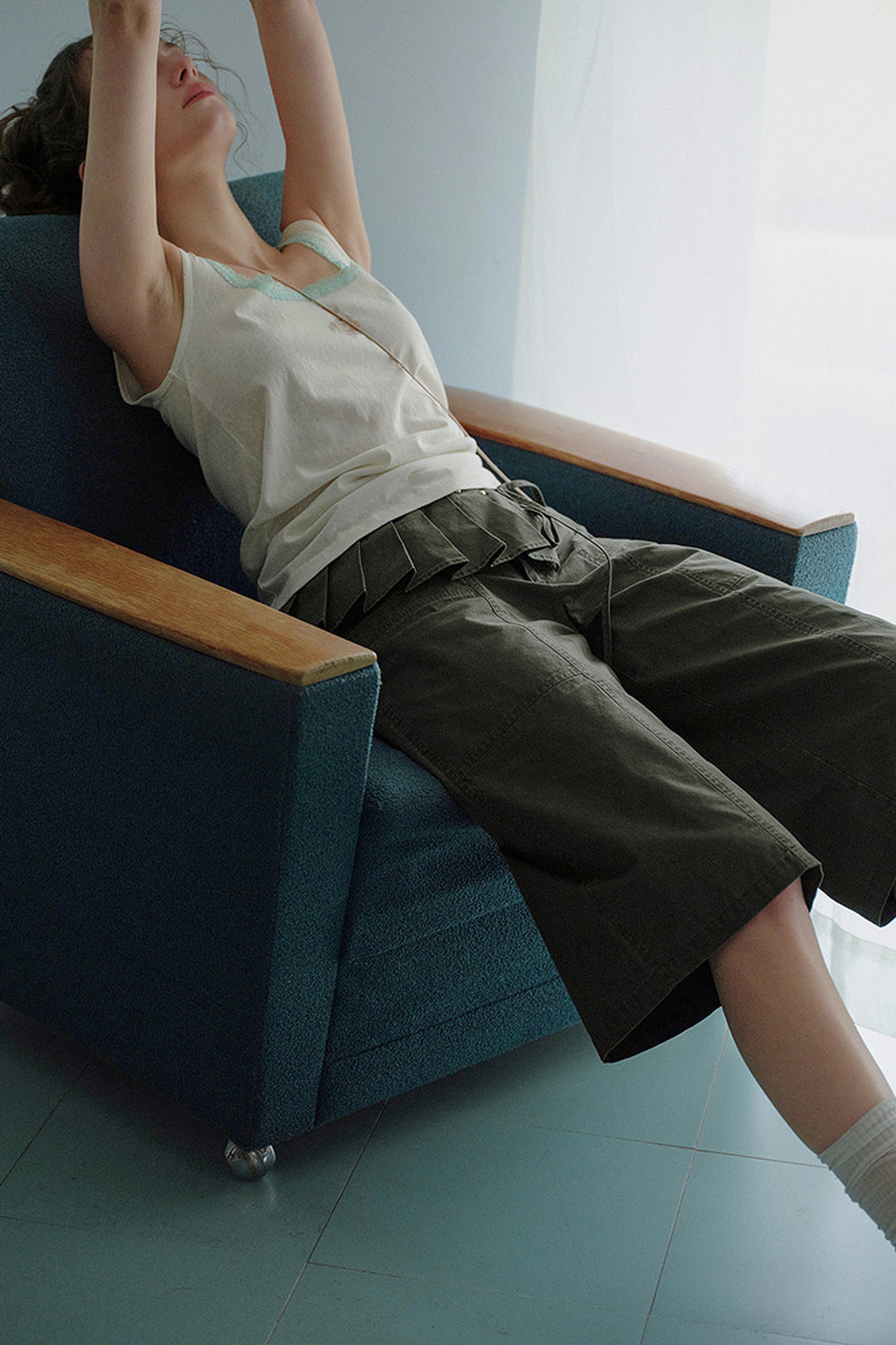 Pantaloni cropped a vita alta con orlo plissettato staccabile