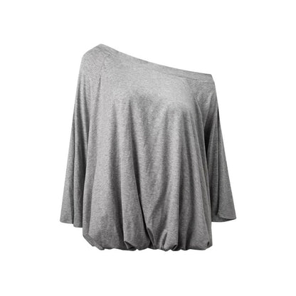Blusa floreale con maniche a sbuffo e spalle scoperte