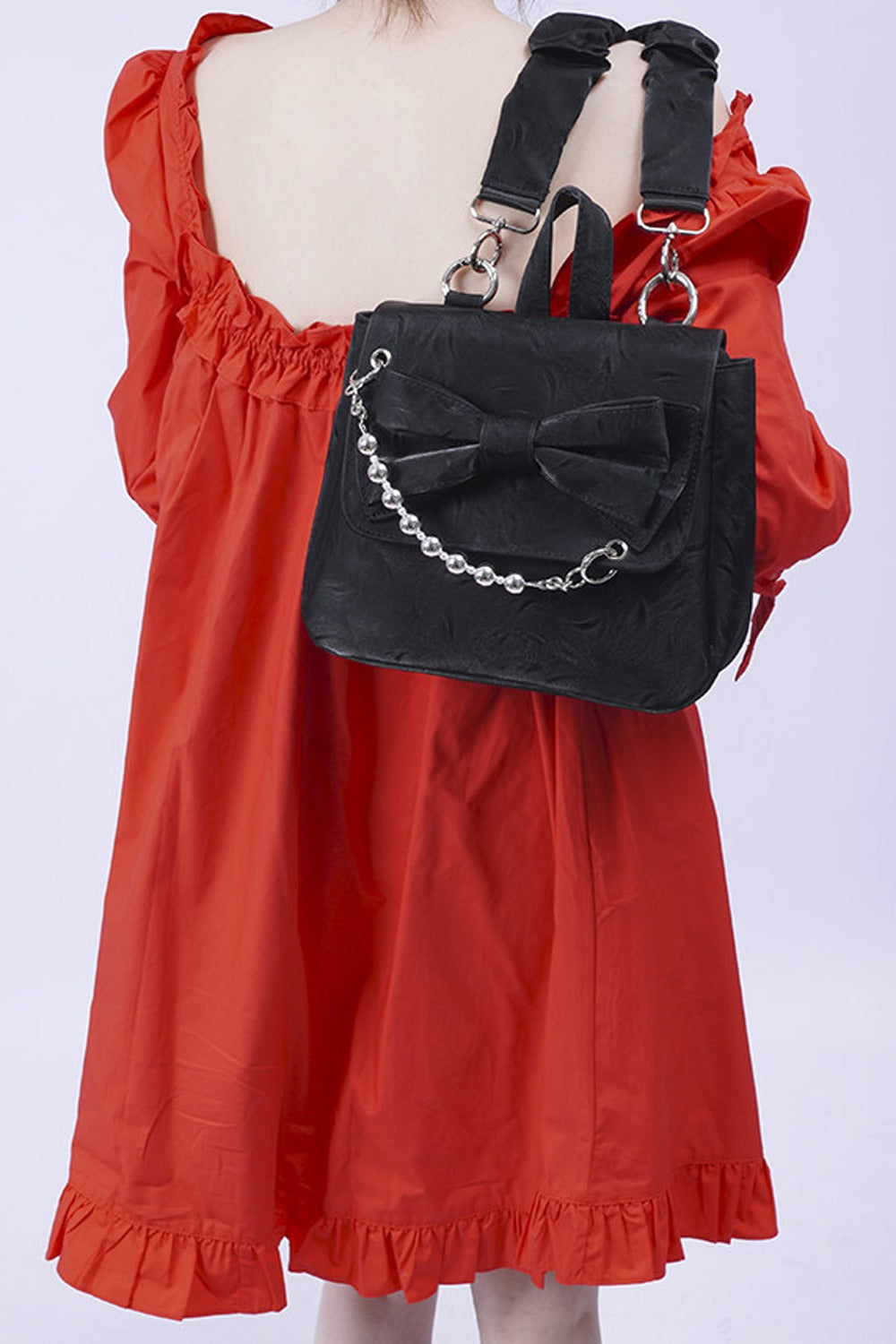 Silver Bow Crossbody Backpack