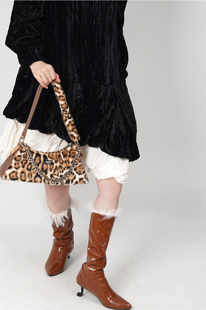 Borsa a mano in pelliccia leopardata a scacchiera