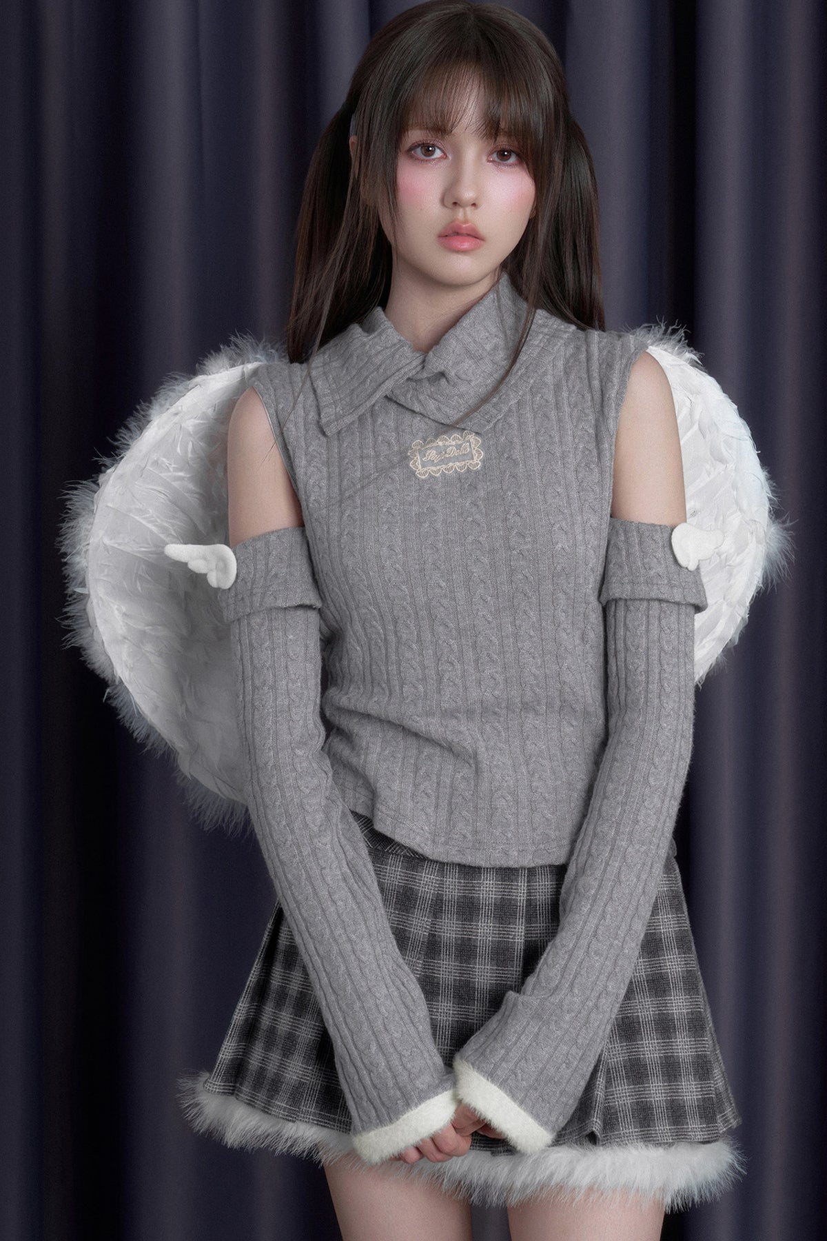 Winged Fold-Over Collar Knit Top