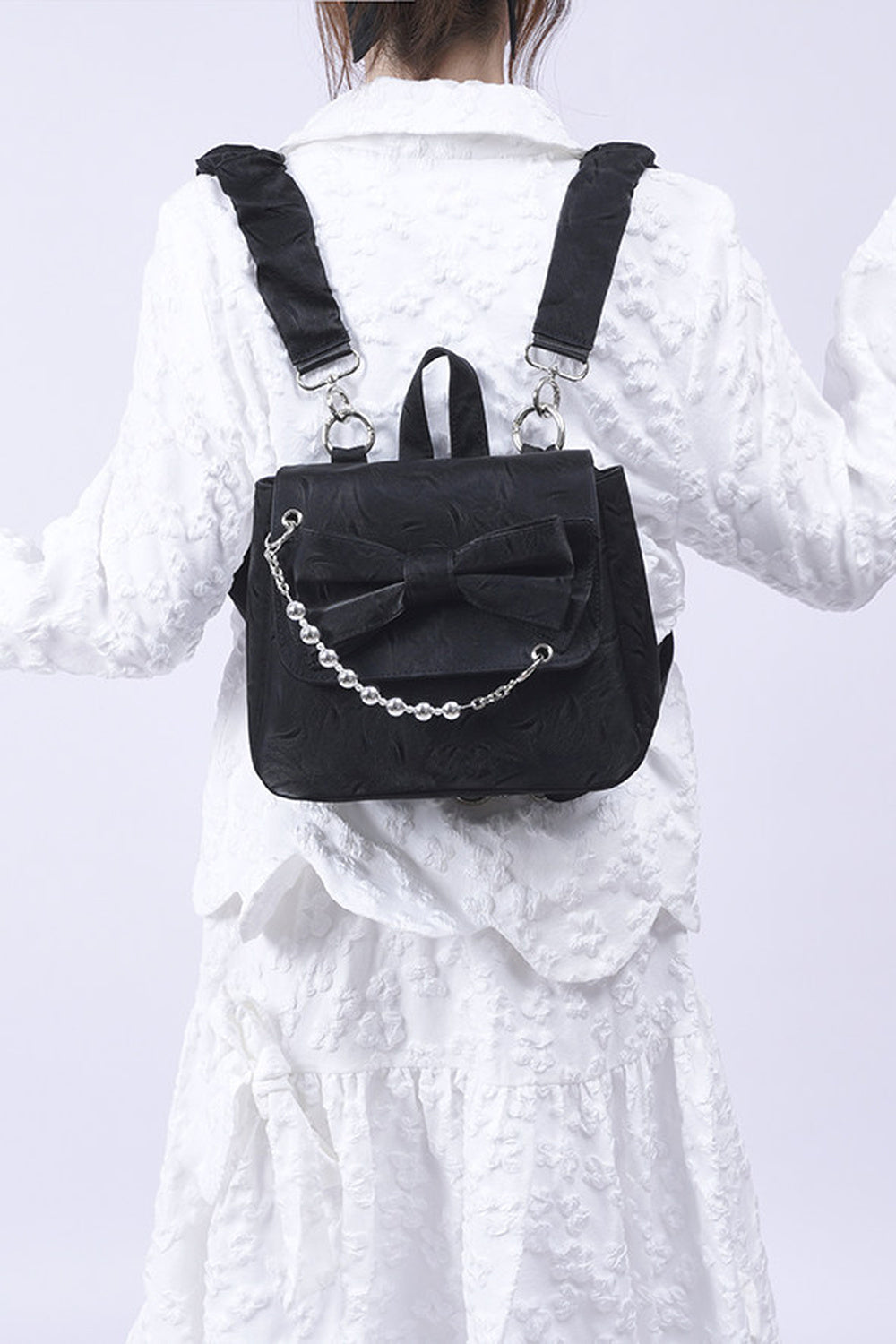 Silver Bow Crossbody Backpack