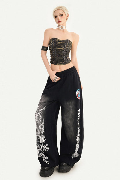 Pantaloni sportivi a gamba larga con stampa grafica