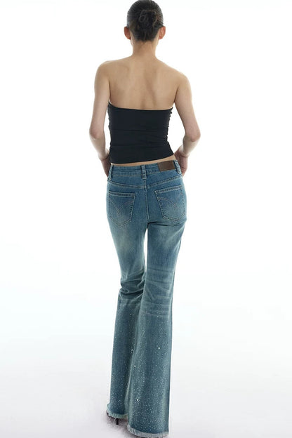 Schlag-Jeanshose mit Strass