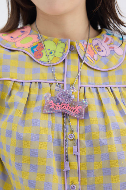 Collier violet translucide en gelée avec nœud et chat