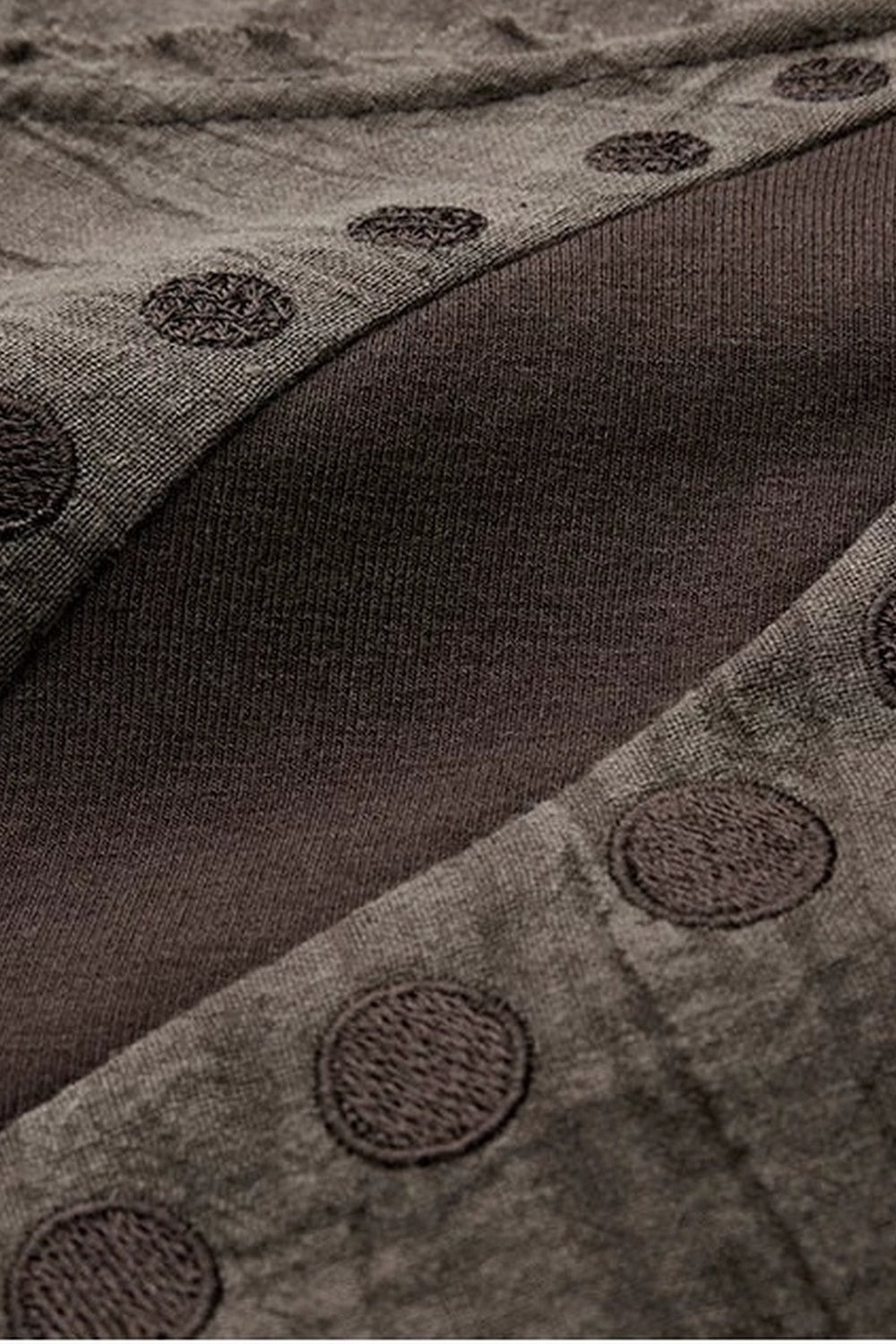 Asymmetrical Eye Embroidery Knit Top