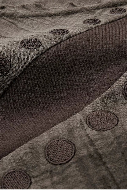 Asymmetrical Eye Embroidery Knit Top
