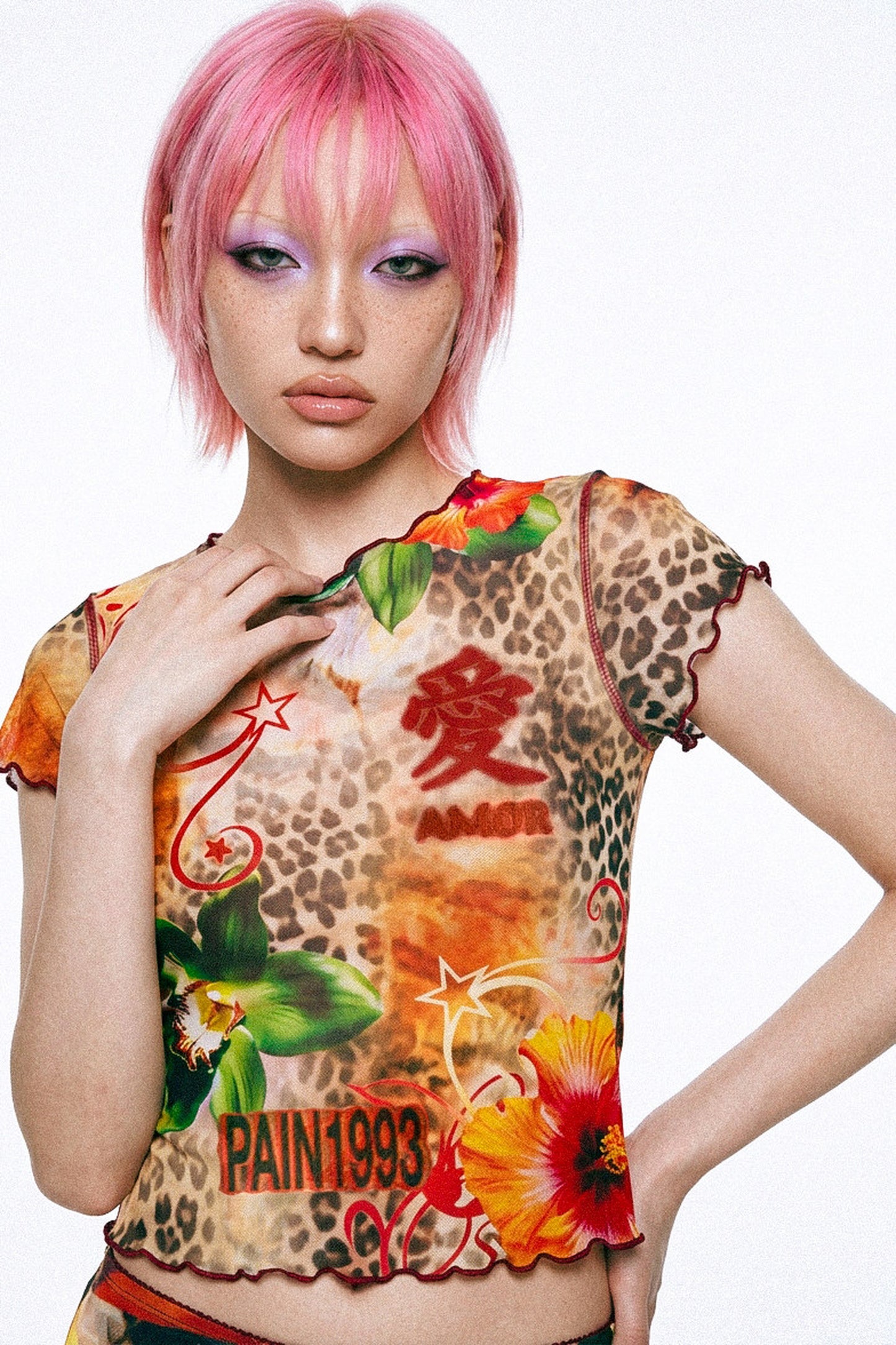 Completo con gonna a sirena in tessuto a rete con stampa leopardata