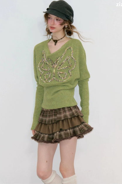 Stricktop mit Schmetterlingsstickerei