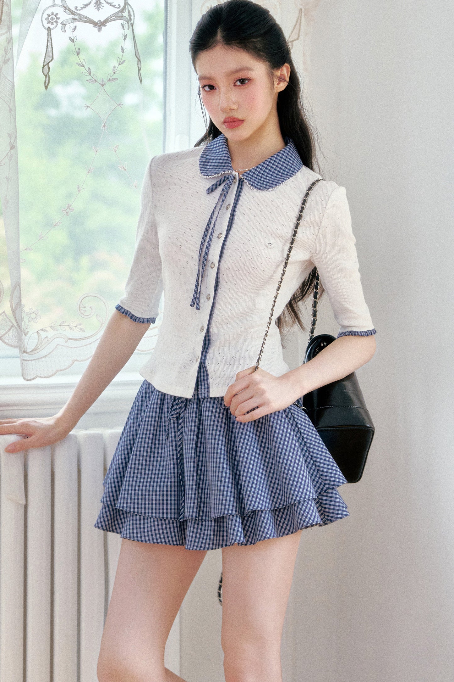 Completo cardigan a maglia bianco con colletto a quadri
