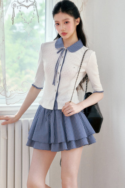 Completo cardigan a maglia bianco con colletto a quadri