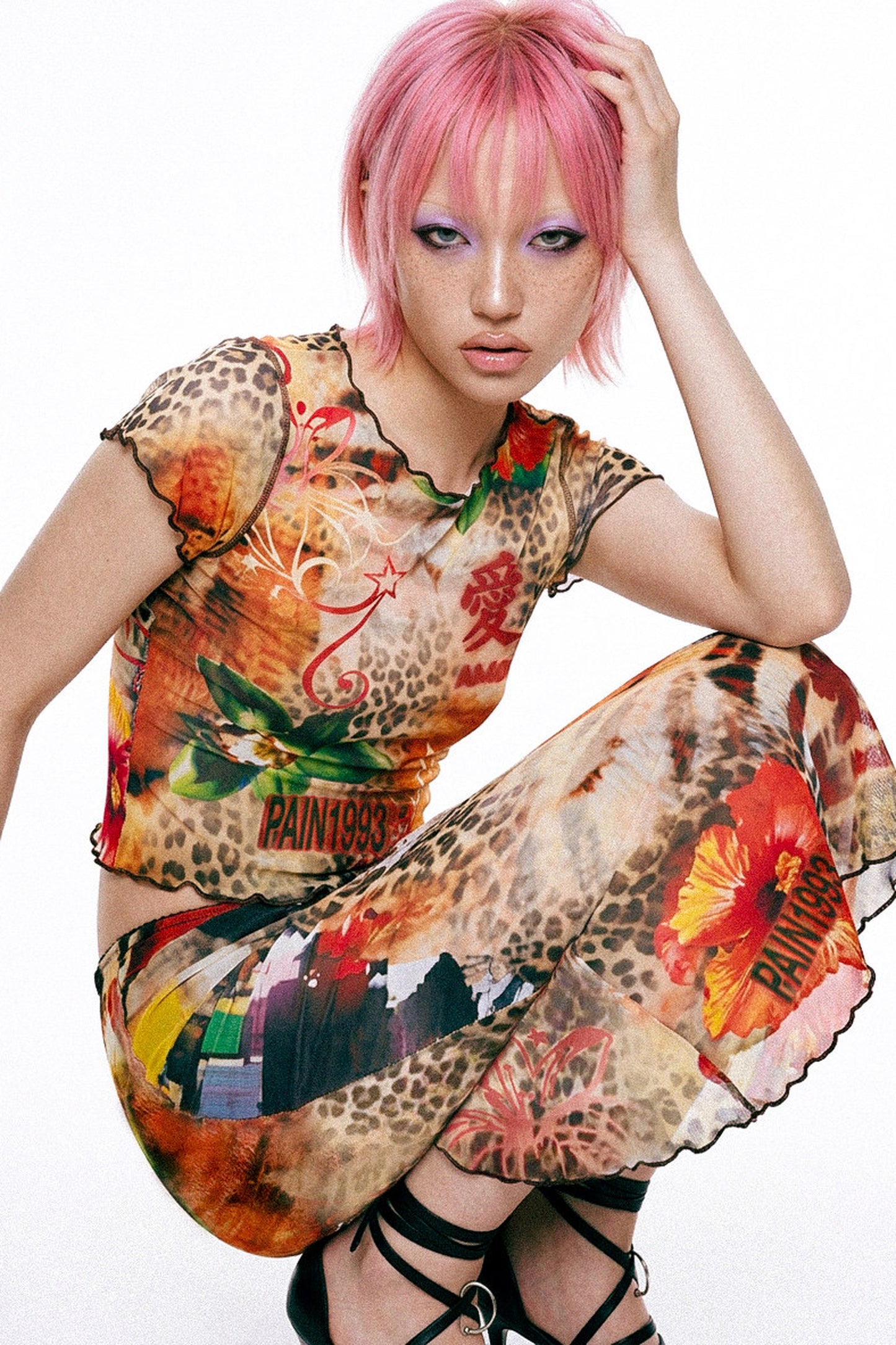 Completo con gonna a sirena in tessuto a rete con stampa leopardata