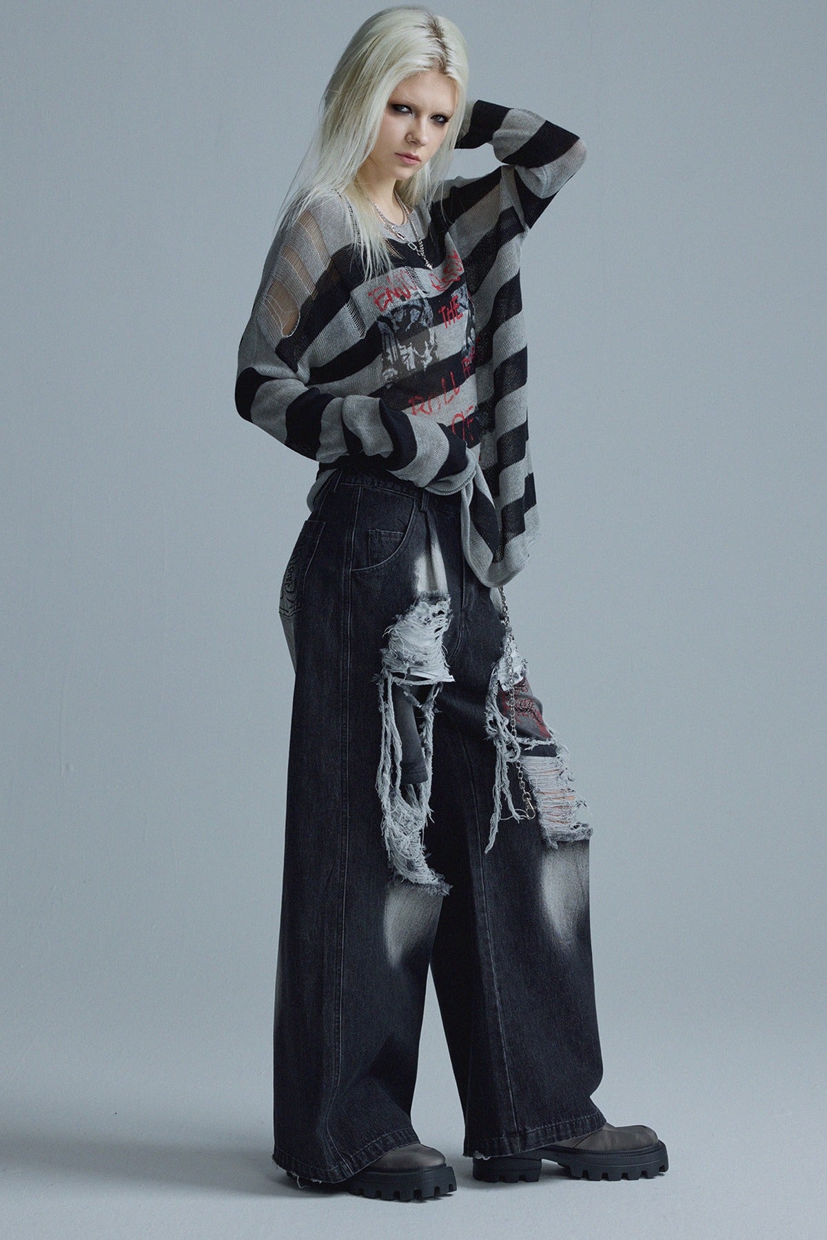 Top in maglia a righe punk a maniche lunghe