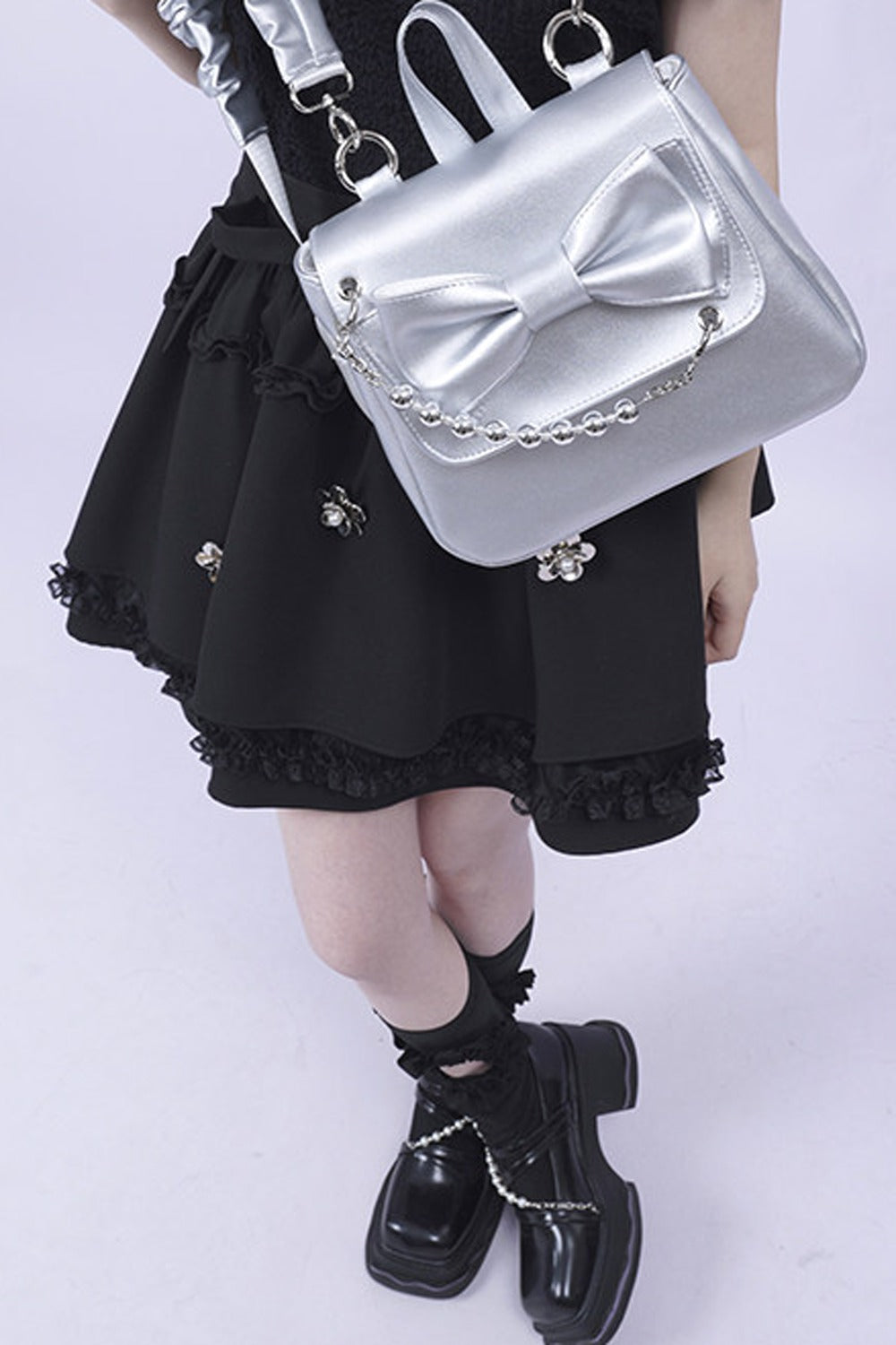 Silver Bow Crossbody Backpack